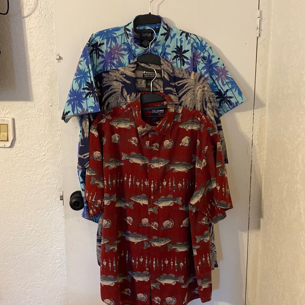 Lot of 3 button down mens shirts.